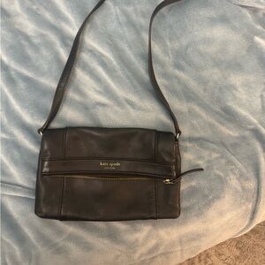 Crossbody black leather Kate spade purse.